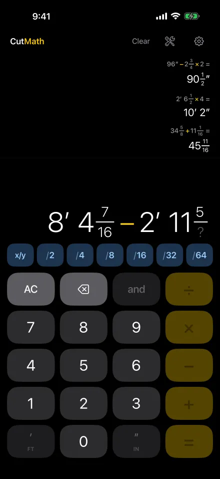 Typing 8′ 4 7/16″ − 2′ 11 5/…, with the denominator keys lit up to finish the fraction